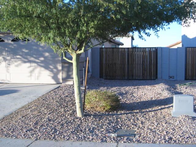 4328 West Maldonado Road Laveen, AZ 85339 - Photo 4 of 24 East side yard