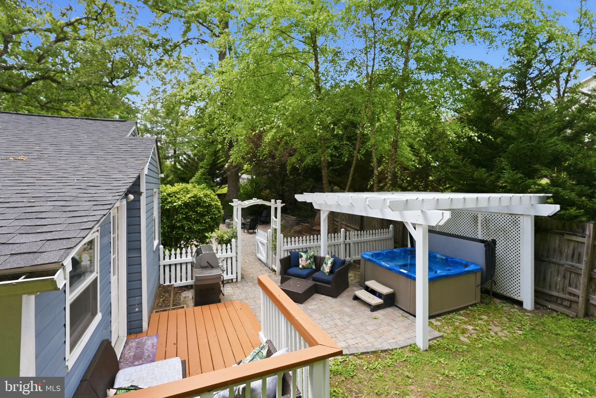 7309 Neuman Street Springfield, VA 22150 - Photo 3 of 33 hot tub area with paver patio