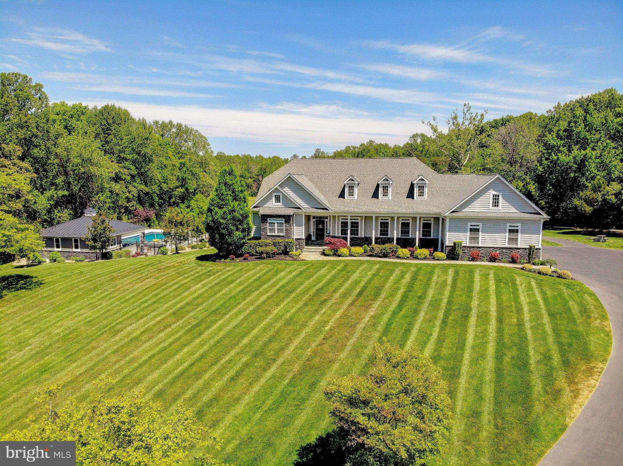 Spacious home with lush green lawns.
