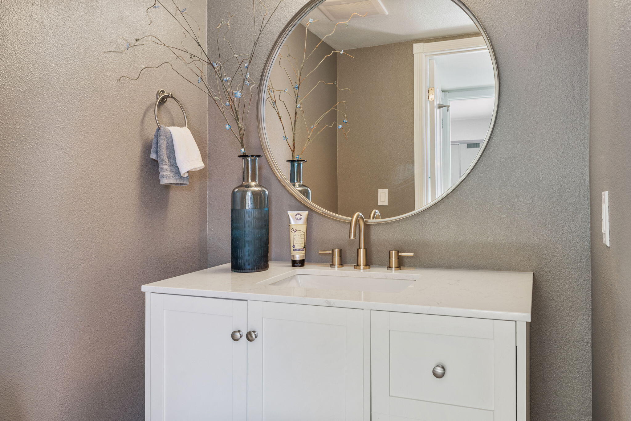 56 Majorca Drive Rancho Mirage, CA 92270 - Photo 20 of 33 a bathroom with a sink and a mirror