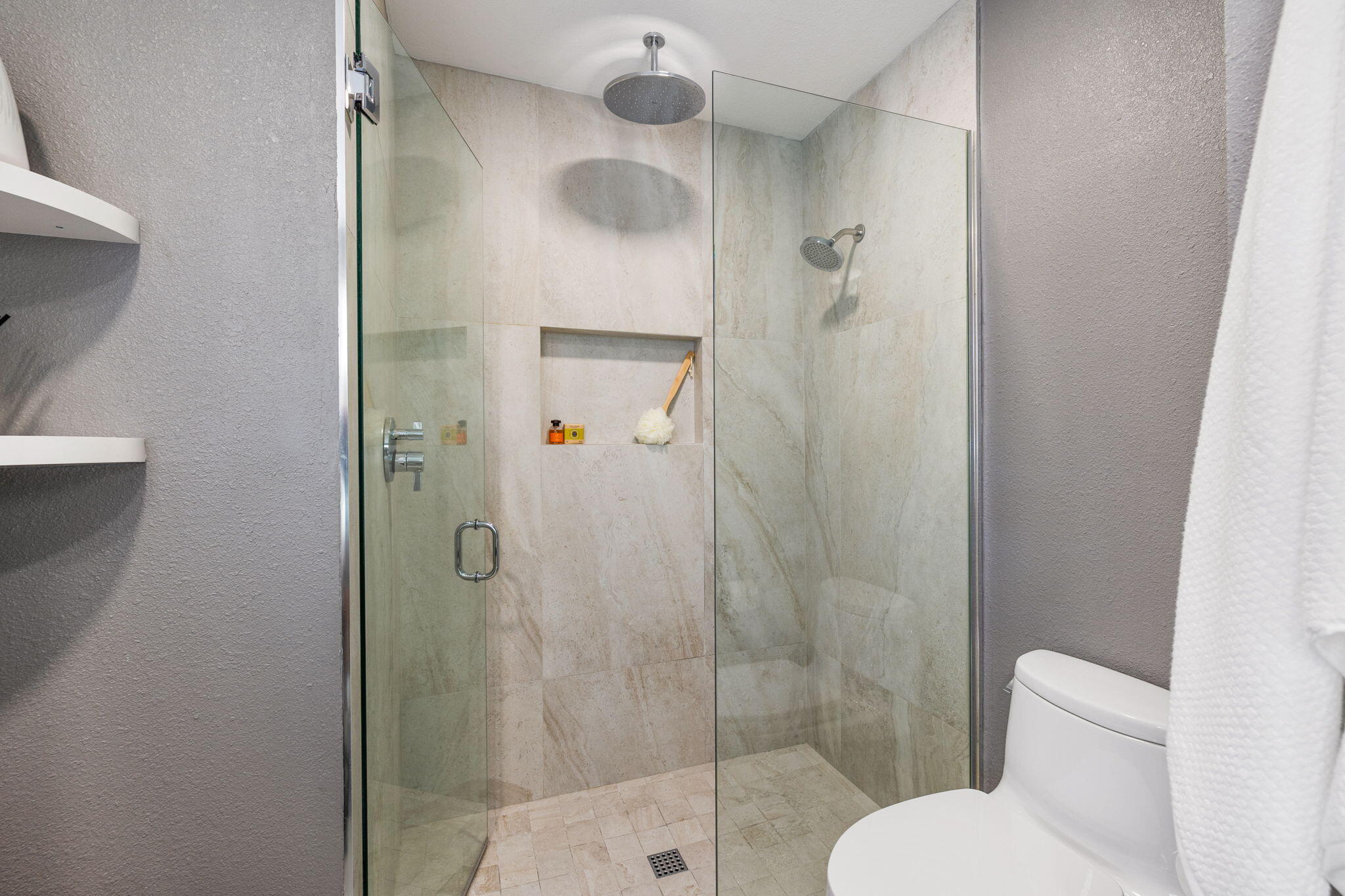 56 Majorca Drive Rancho Mirage, CA 92270 - Photo 25 of 33 a bathroom with a shower and toilet