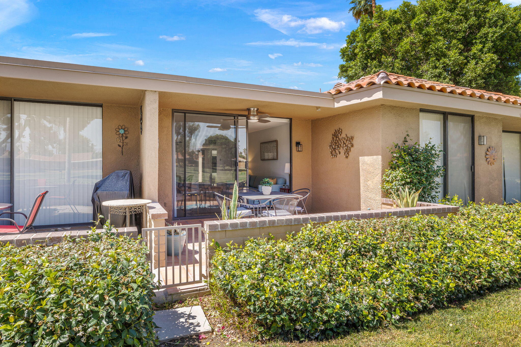 56 Majorca Drive Rancho Mirage, CA 92270 - Photo 26 of 33 a front view of a house with garden