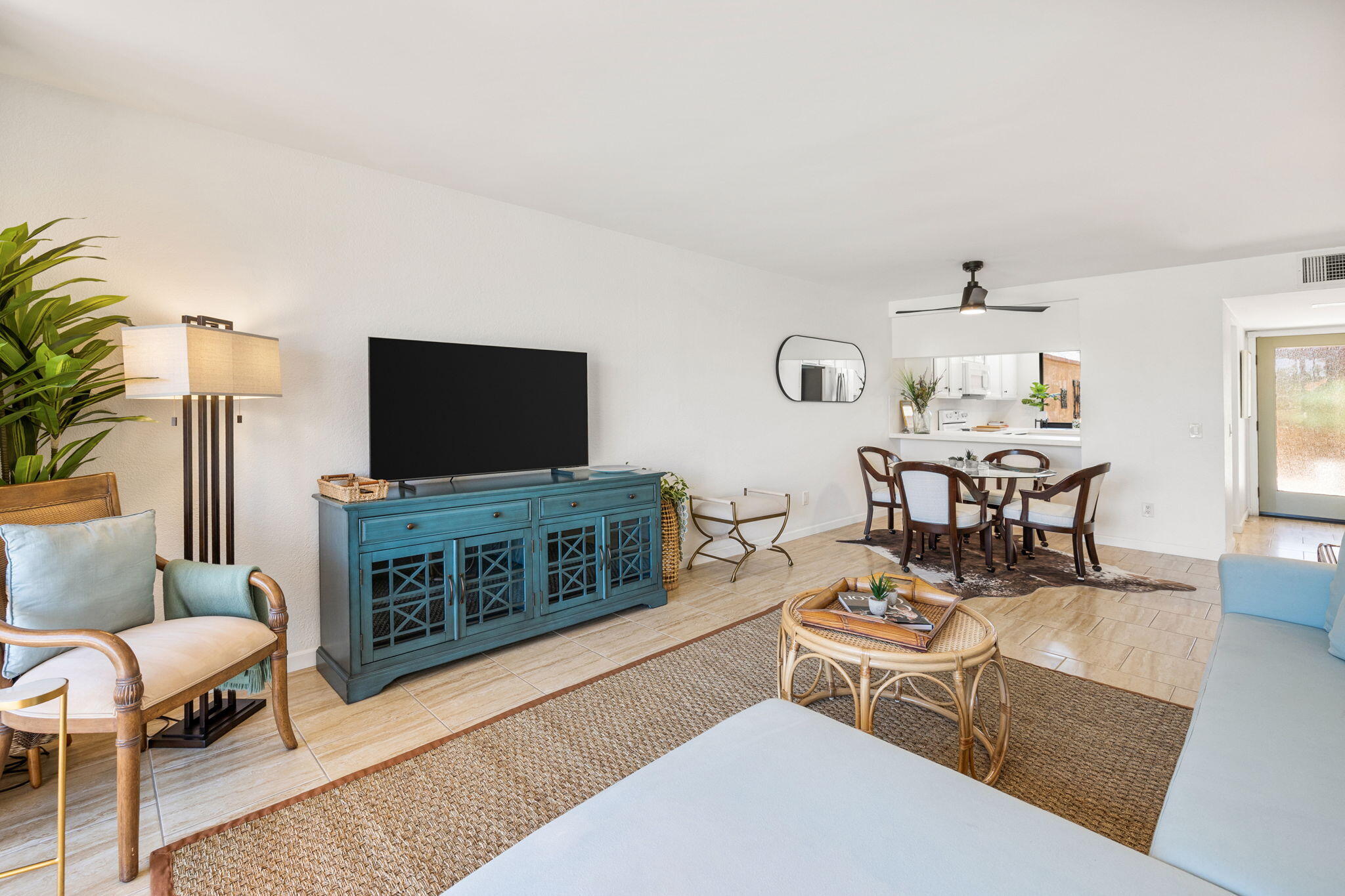 56 Majorca Drive Rancho Mirage, CA 92270 - Photo 4 of 33 a living room with furniture and a flat screen tv