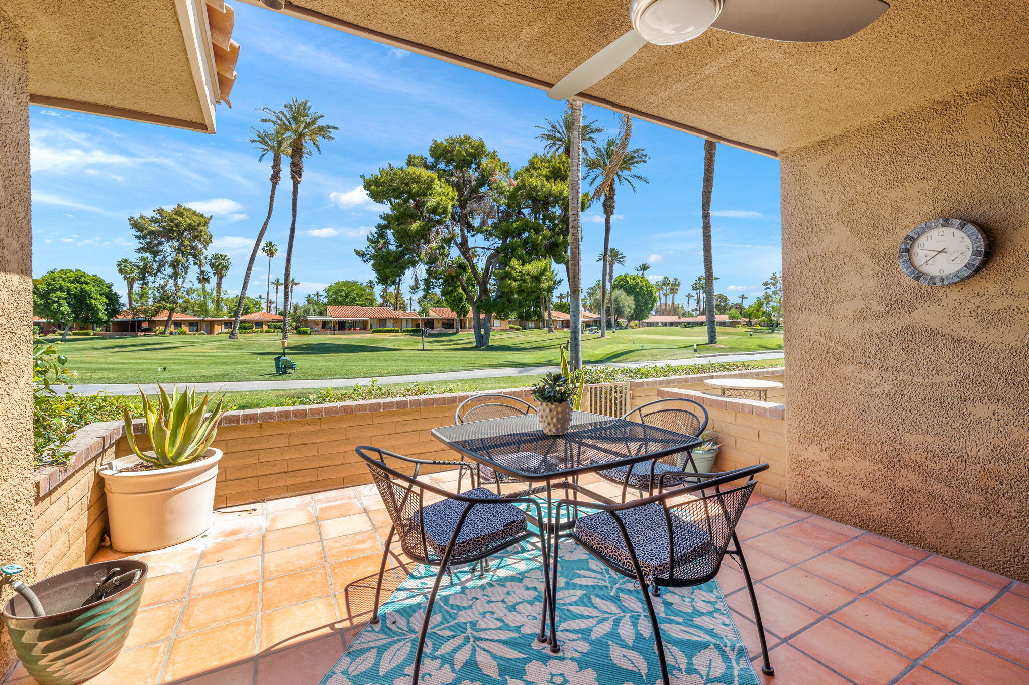56 Majorca Drive Rancho Mirage, CA 92270 - Photo 6 of 33 a patio with a yard table and chairs