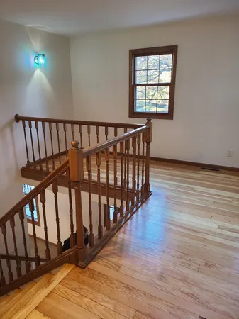 a view of entryway with wooden floor