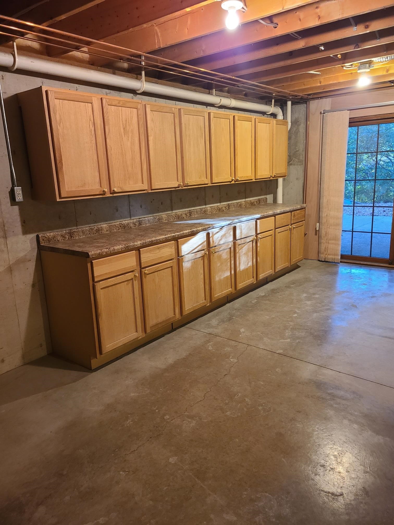 2871 East 777th Road Utica, IL 61373 - Photo 16 of 23 a view of a kitchen with stainless steel appliances granite countertop a stove and a sink