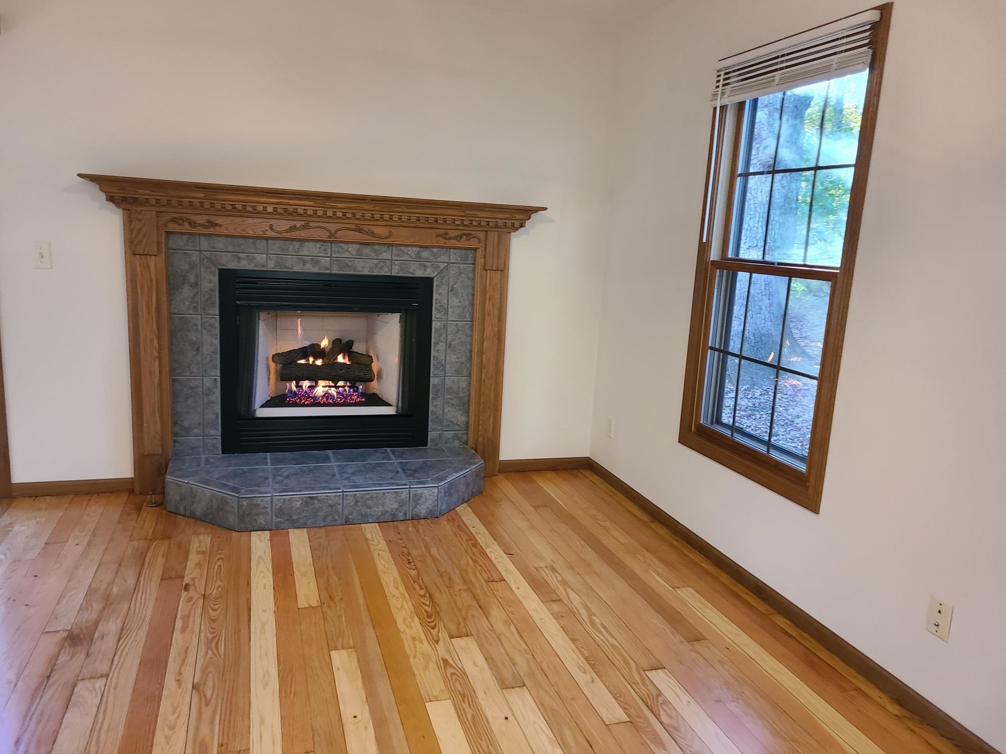 2871 East 777th Road Utica, IL 61373 - Photo 3 of 23 a view of an empty room and wooden floor