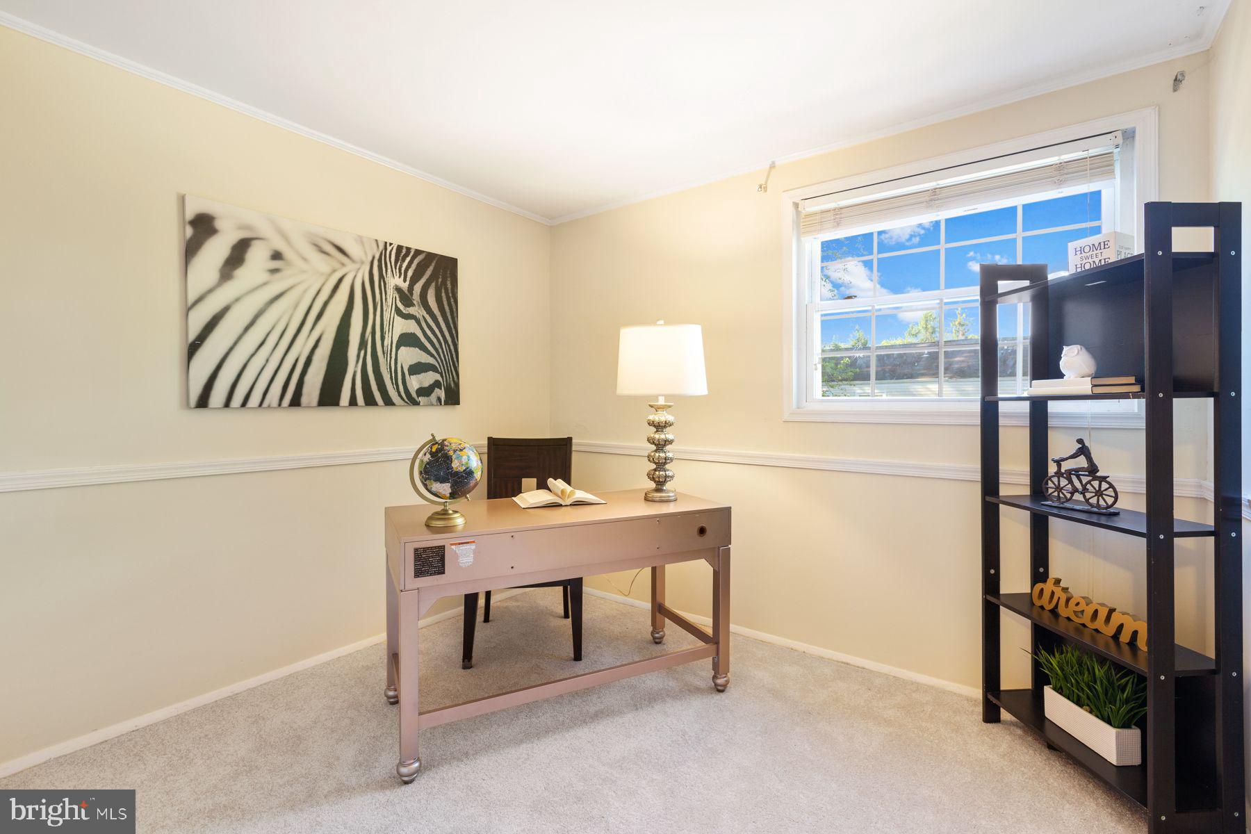 17660 Kohlhoss Road Poolesville, MD 20837 - Photo 15 of 22 a view of a workspace with furniture and a window