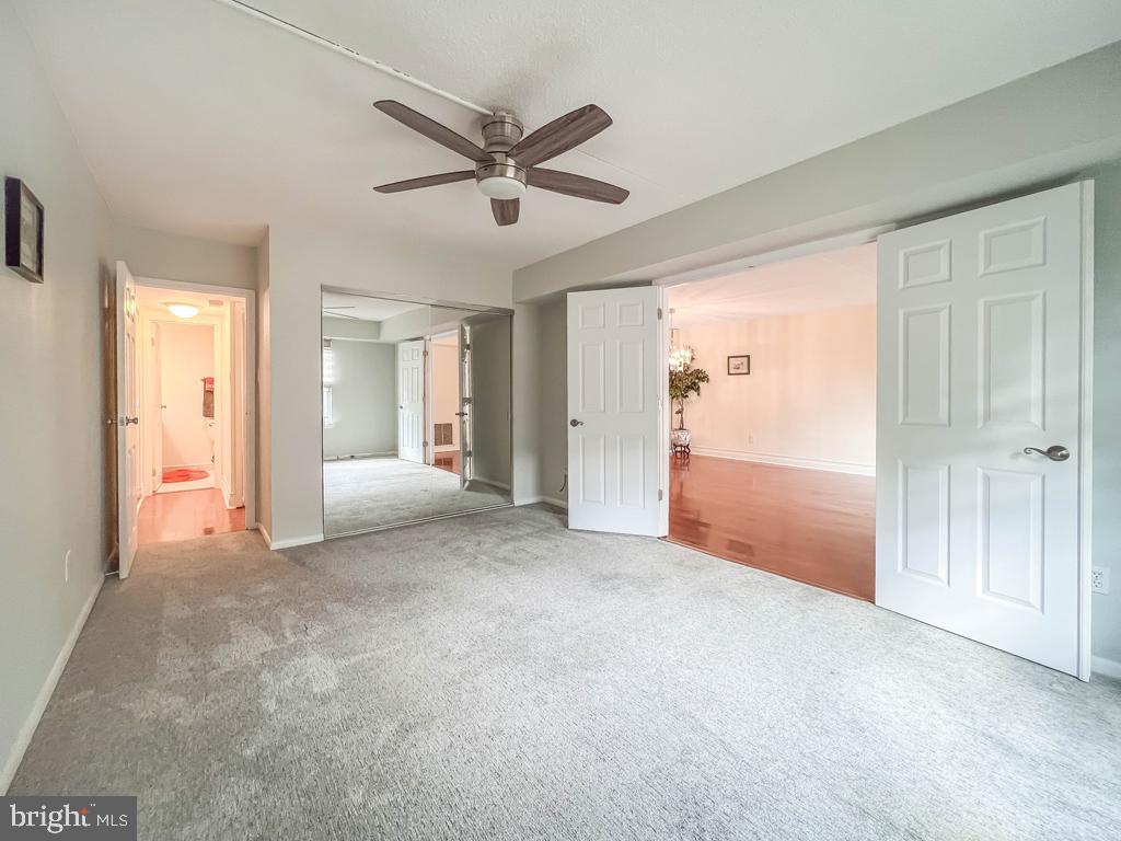6204 Delaire Landing Road, Unit 204 Philadelphia, PA 19114 - Photo 24 of 40 a view of a livingroom with a ceiling fan