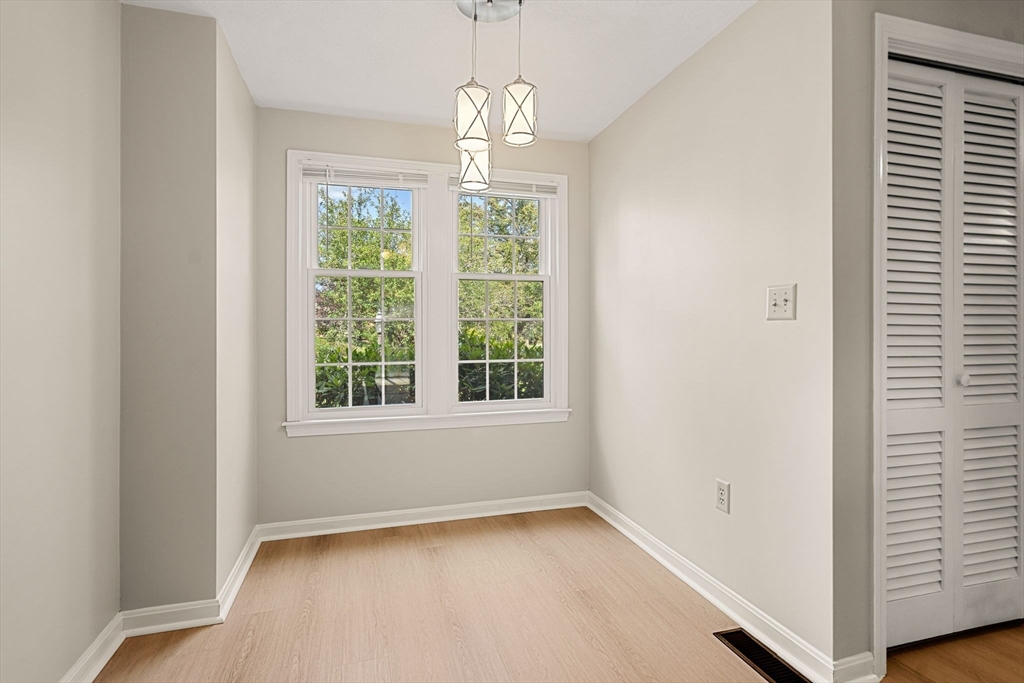 290 Apache Way, Unit 290 Tewksbury, MA 01876 - Photo 12 of 29 a view of an empty room with a window