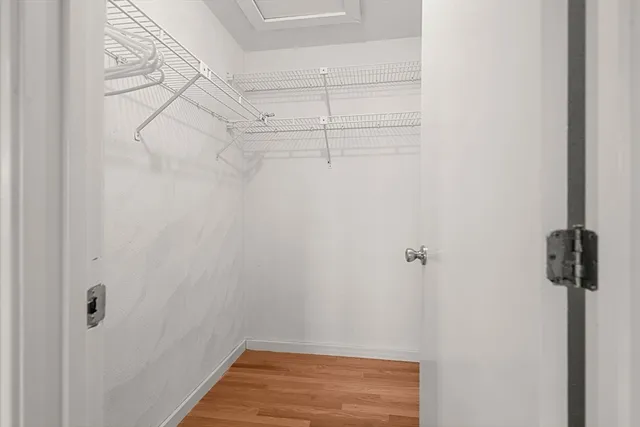 a view of a room with racks on the wall