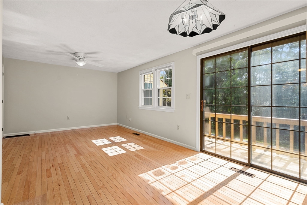 290 Apache Way, Unit 290 Tewksbury, MA 01876 - Photo 6 of 29 a view of an empty room and window