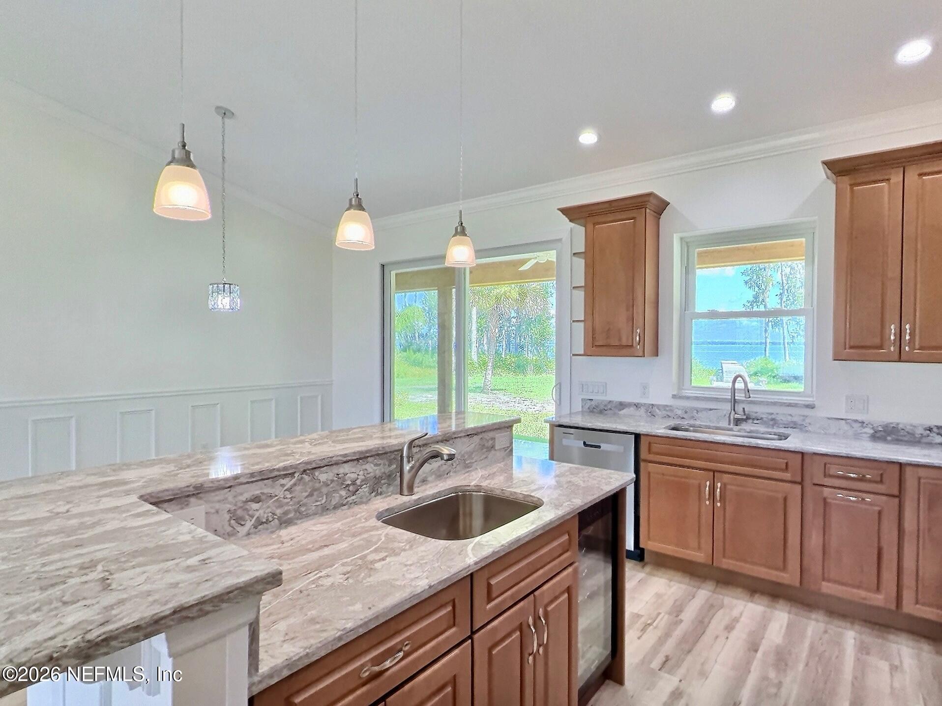159 Mays Cove Road East Palatka, FL 32131 - Photo 11 of 62 a kitchen with a sink stove and cabinets