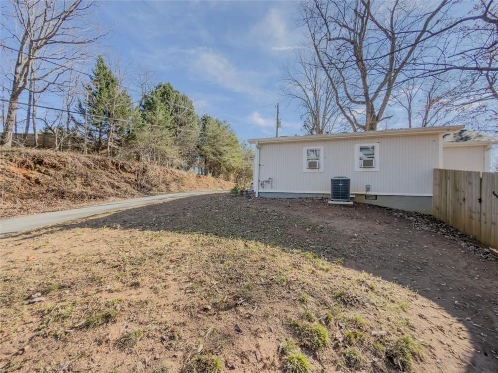 2317 Ford White Road Gainesville, GA 30506 - Photo 26 of 27 a view of a house with a yard