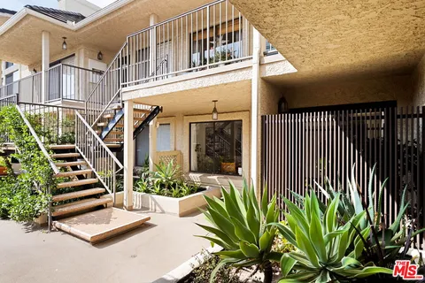 a view of entryway with a front door