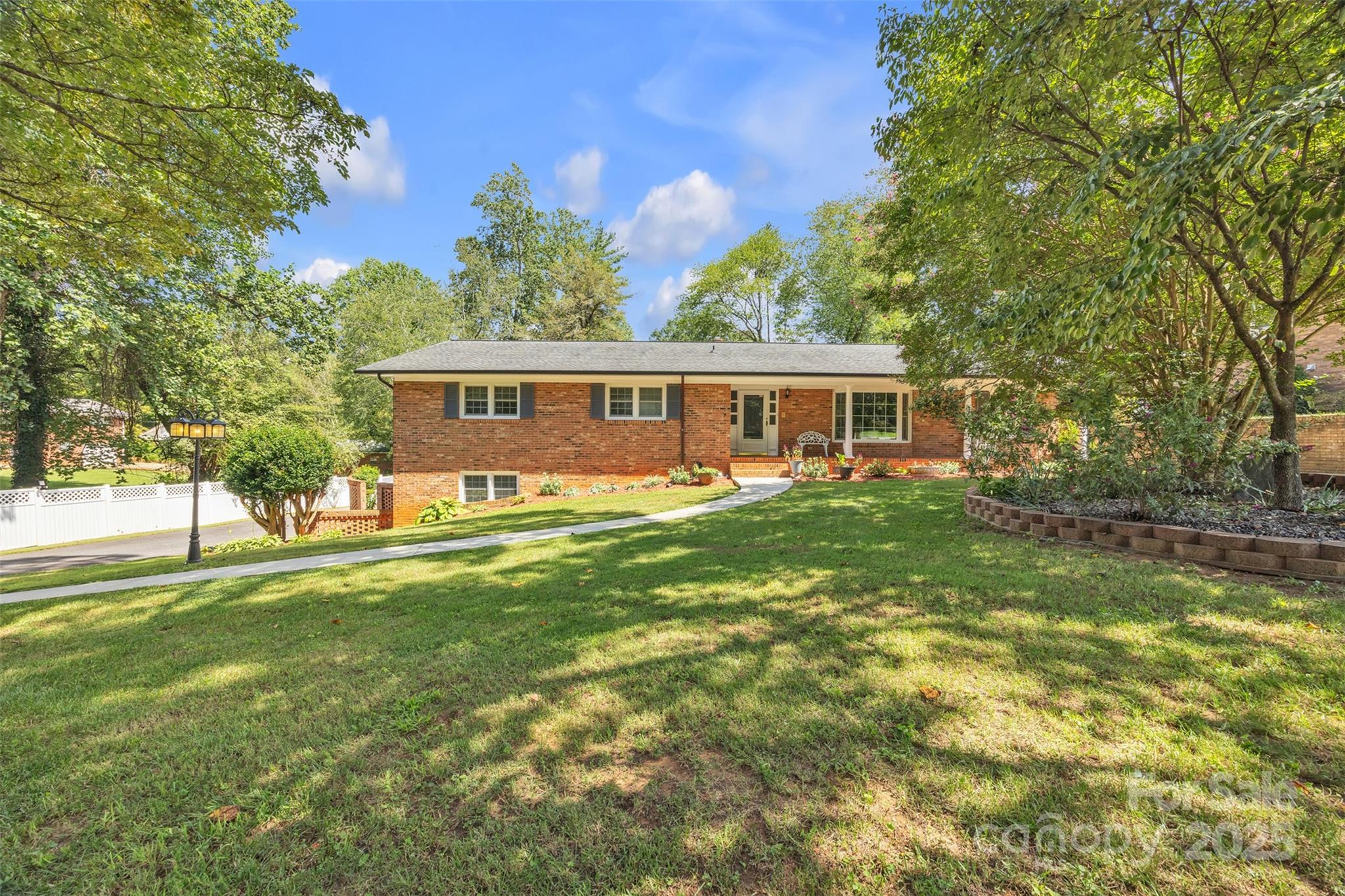 312 2nd Avenue Northeast Conover, NC 28613 - Photo 1 of 1 a view of a house with a backyard
