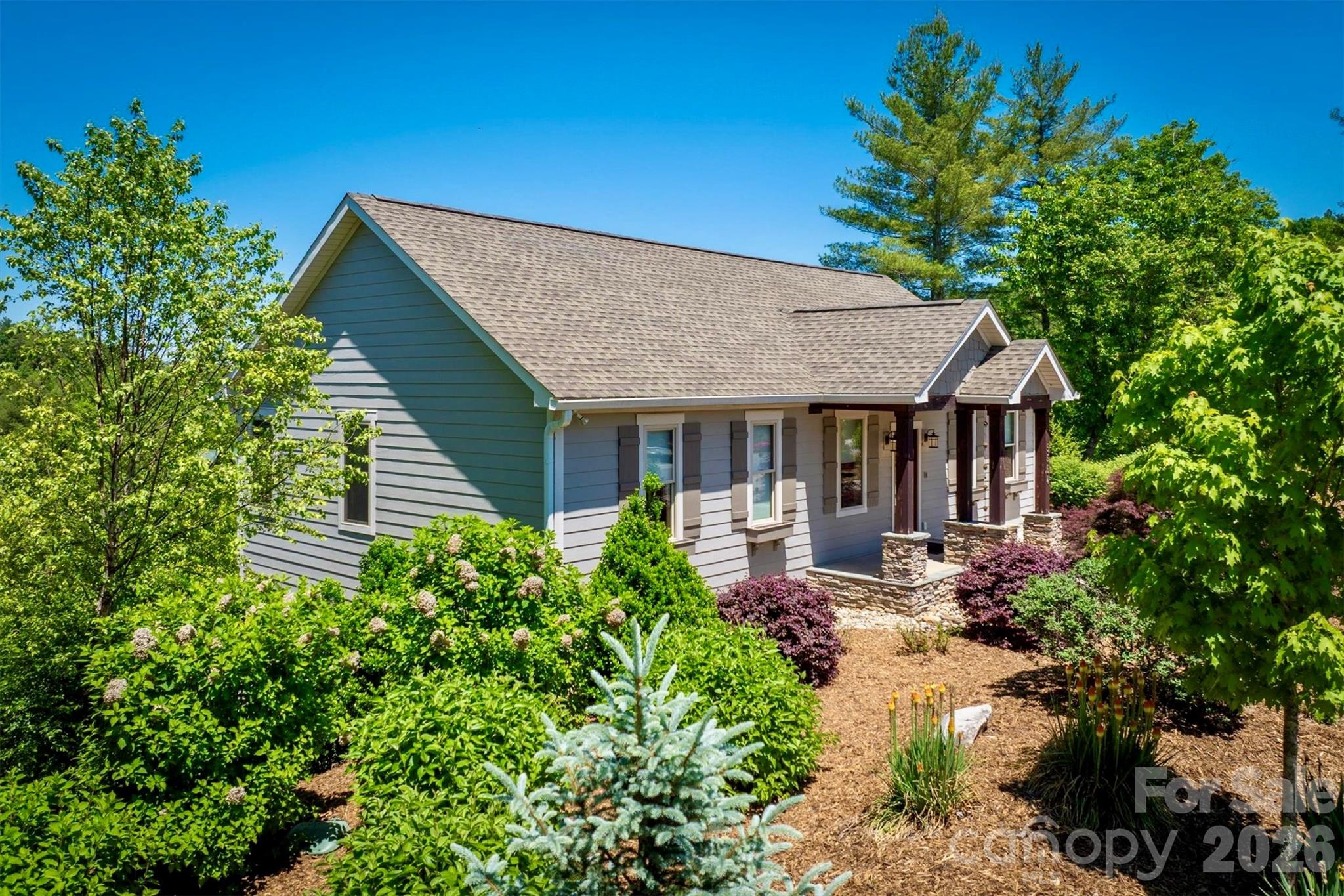 5564 Table View Lane Lenoir, NC 28645 - Photo 2 of 48 a view of a house with sitting area and garden