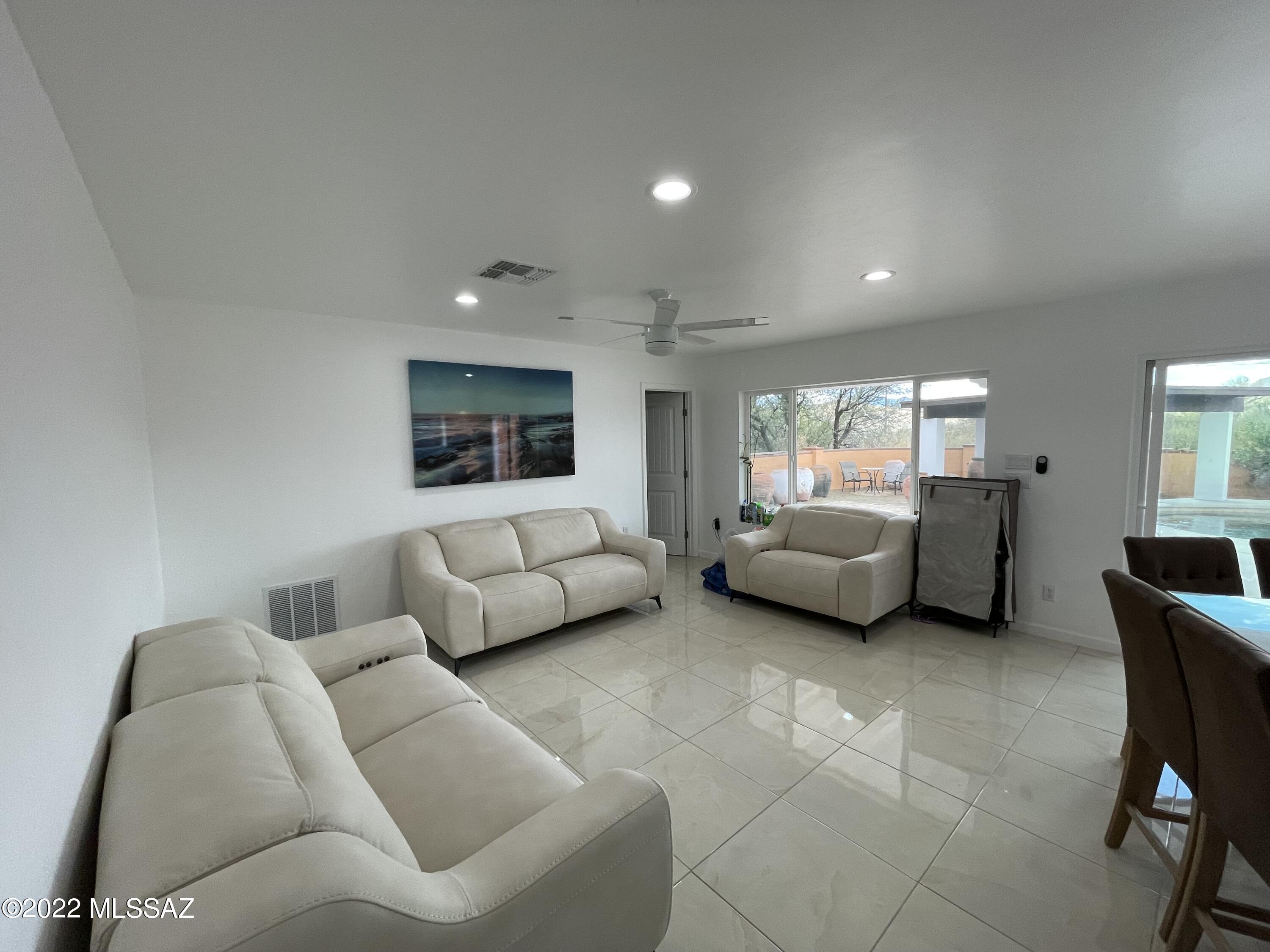 126 Avenida Ostion Rio Rico, AZ 85648 - Photo 9 of 31 a living room with furniture and a couch
