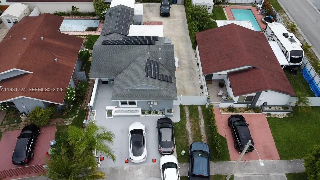12374 Southwest 197th Terrace Miami, FL 33177 - Photo 11 of 18 an aerial view of residential house with outdoor space and parking
