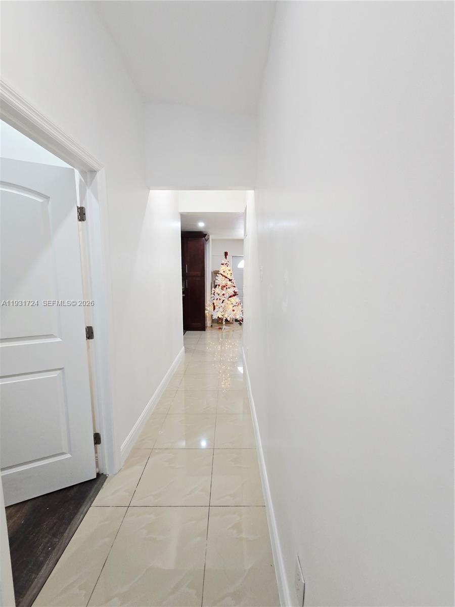 12374 Southwest 197th Terrace Miami, FL 33177 - Photo 7 of 18 a view of an entryway of the house