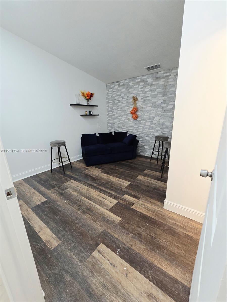 12374 Southwest 197th Terrace Miami, FL 33177 - Photo 9 of 18 a living room with furniture