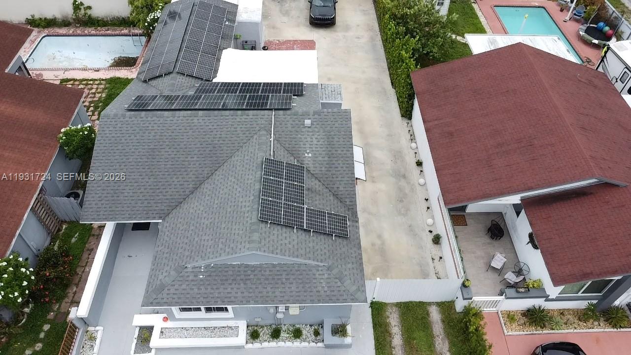 12374 Southwest 197th Terrace Miami, FL 33177 - Photo 10 of 18 an aerial view of residential houses with outdoor space