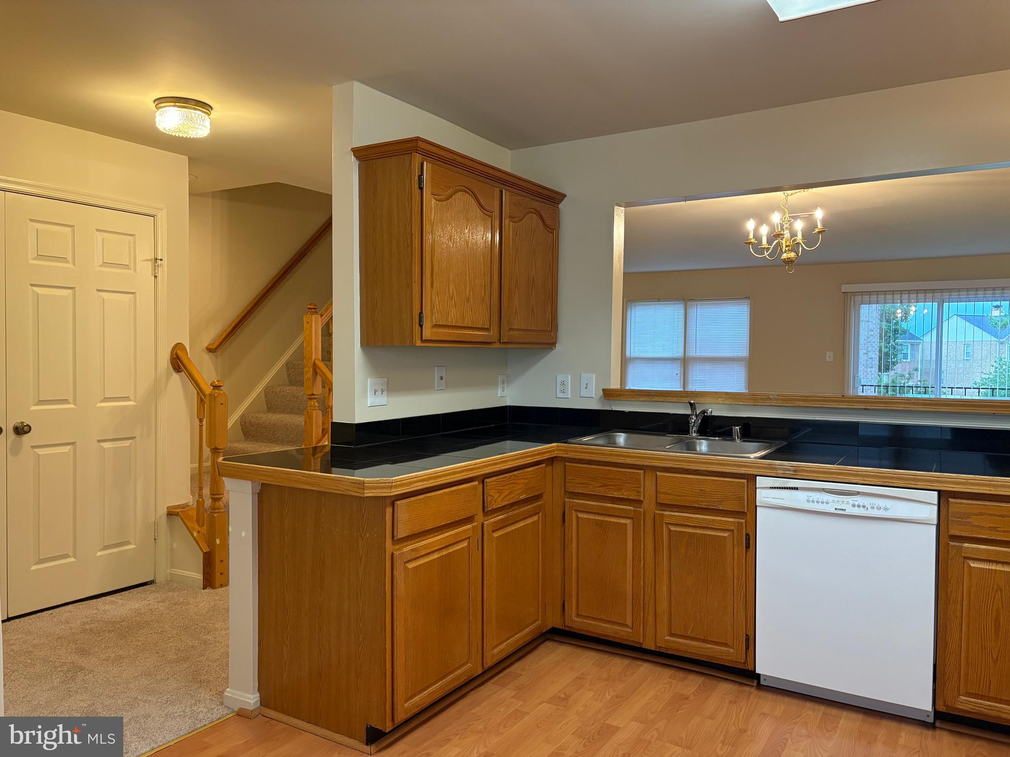 5604 Gresham Lane Centreville, VA 20120 - Photo 18 of 39 Laundry behind the closed doors in this photo