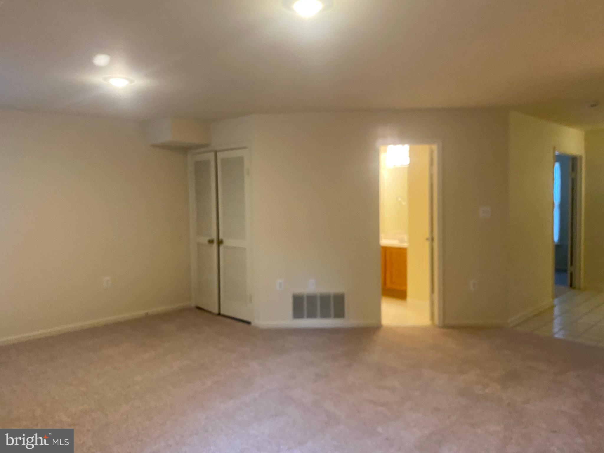 5604 Gresham Lane Centreville, VA 20120 - Photo 5 of 39 Main level rec room in relation to full bath