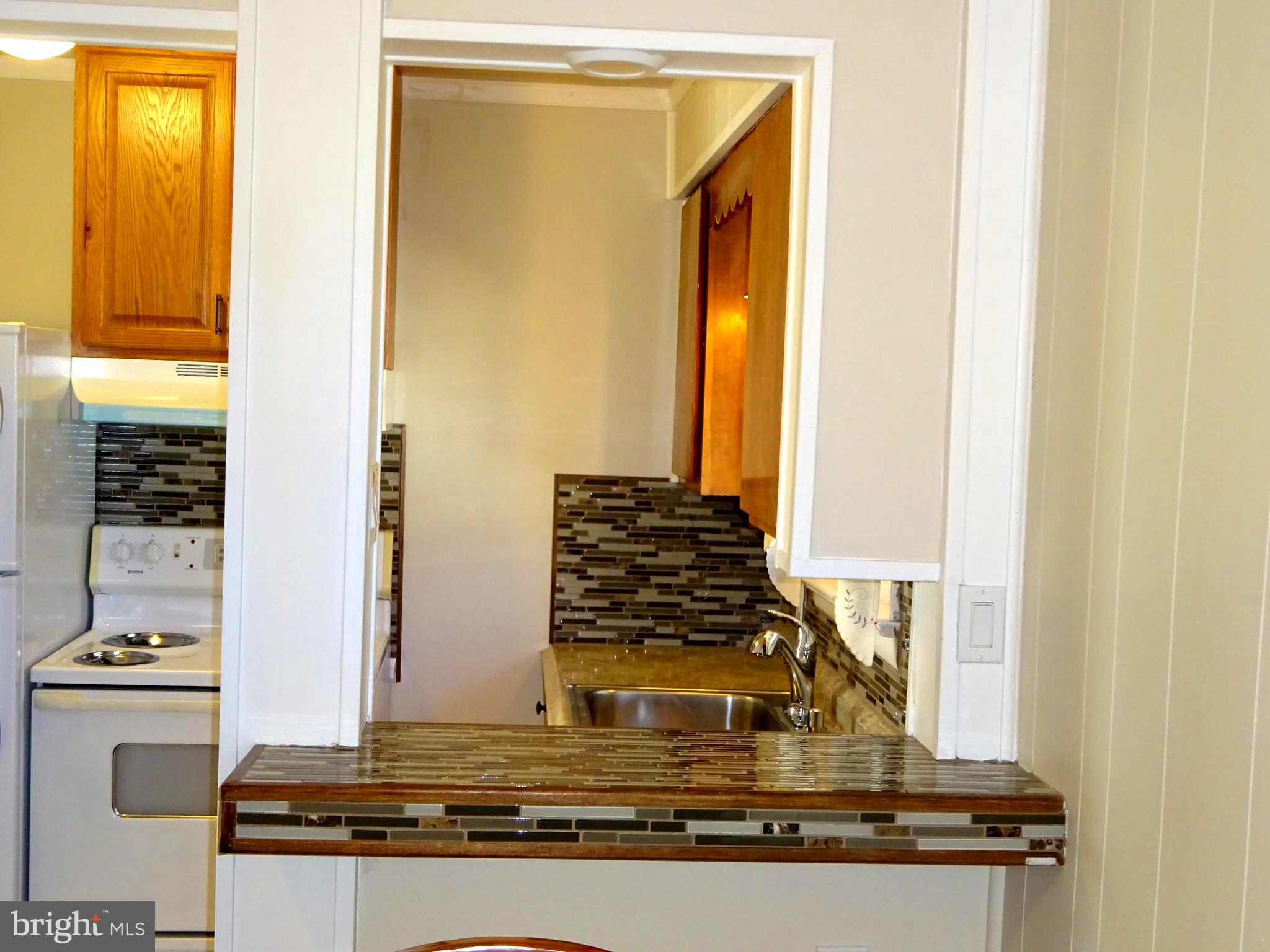 274 Johnson Street Carneys Point, NJ 08069 - Photo 25 of 56 Bar / Counter Top Between Dining Room & Kitchen