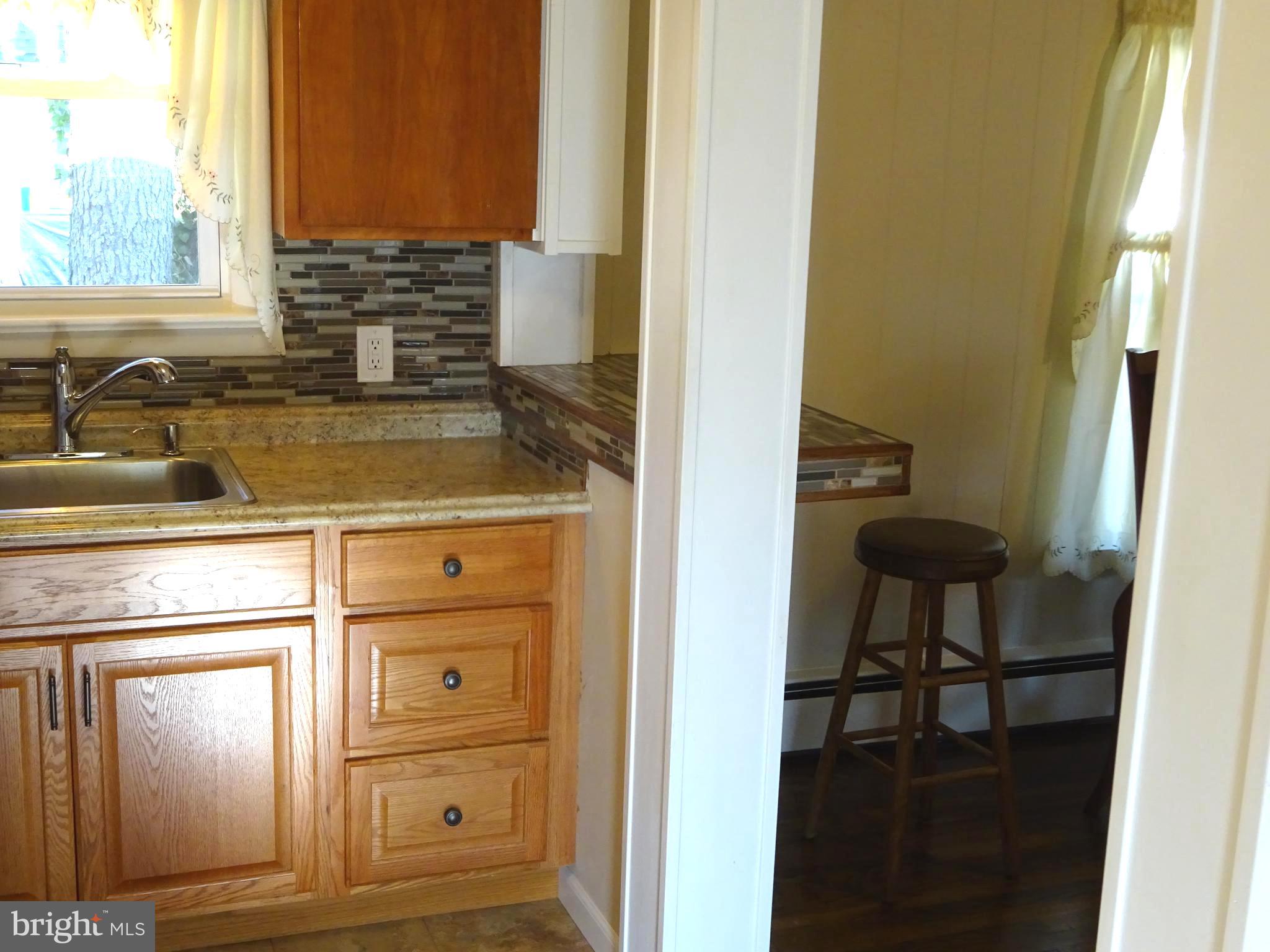 274 Johnson Street Carneys Point, NJ 08069 - Photo 27 of 56 Bar / Counter Top Between Dining Room & Kitchen