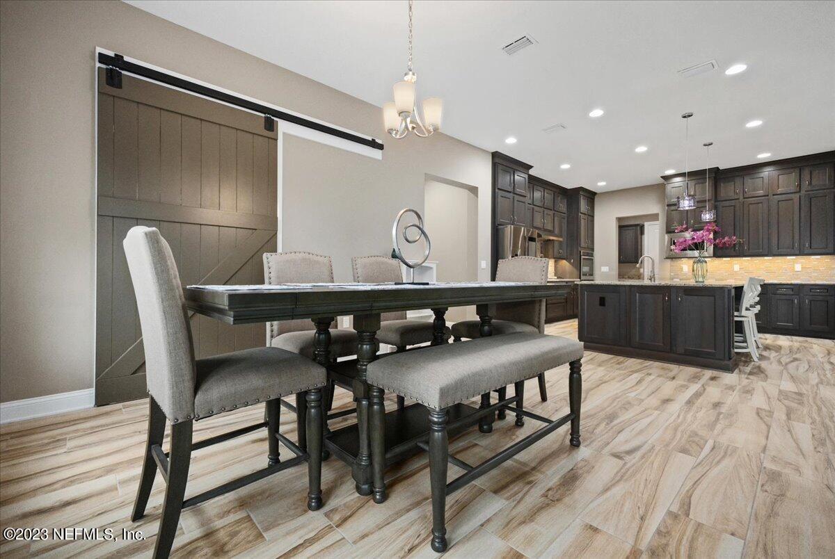39 Seahill Drive St. Augustine, FL 32092 - Photo 11 of 37 a view of a dining room with furniture