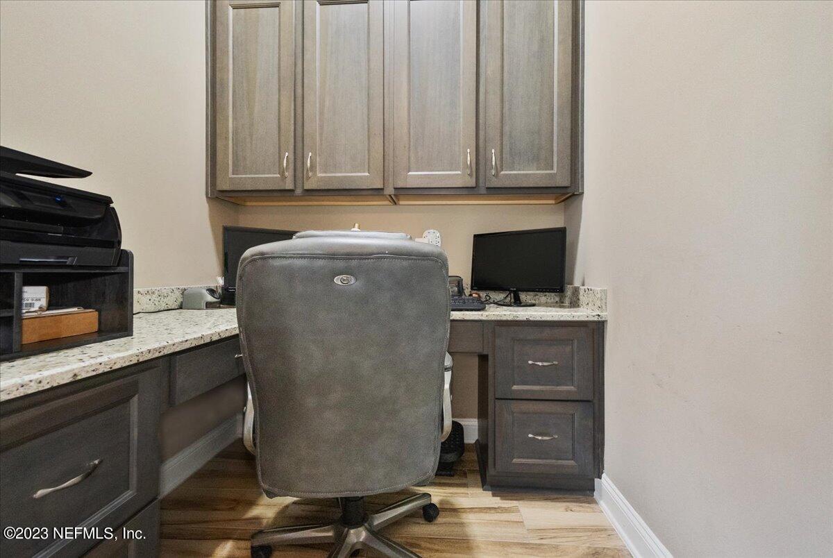 39 Seahill Drive St. Augustine, FL 32092 - Photo 14 of 37 a view of cabinets and wooden floor