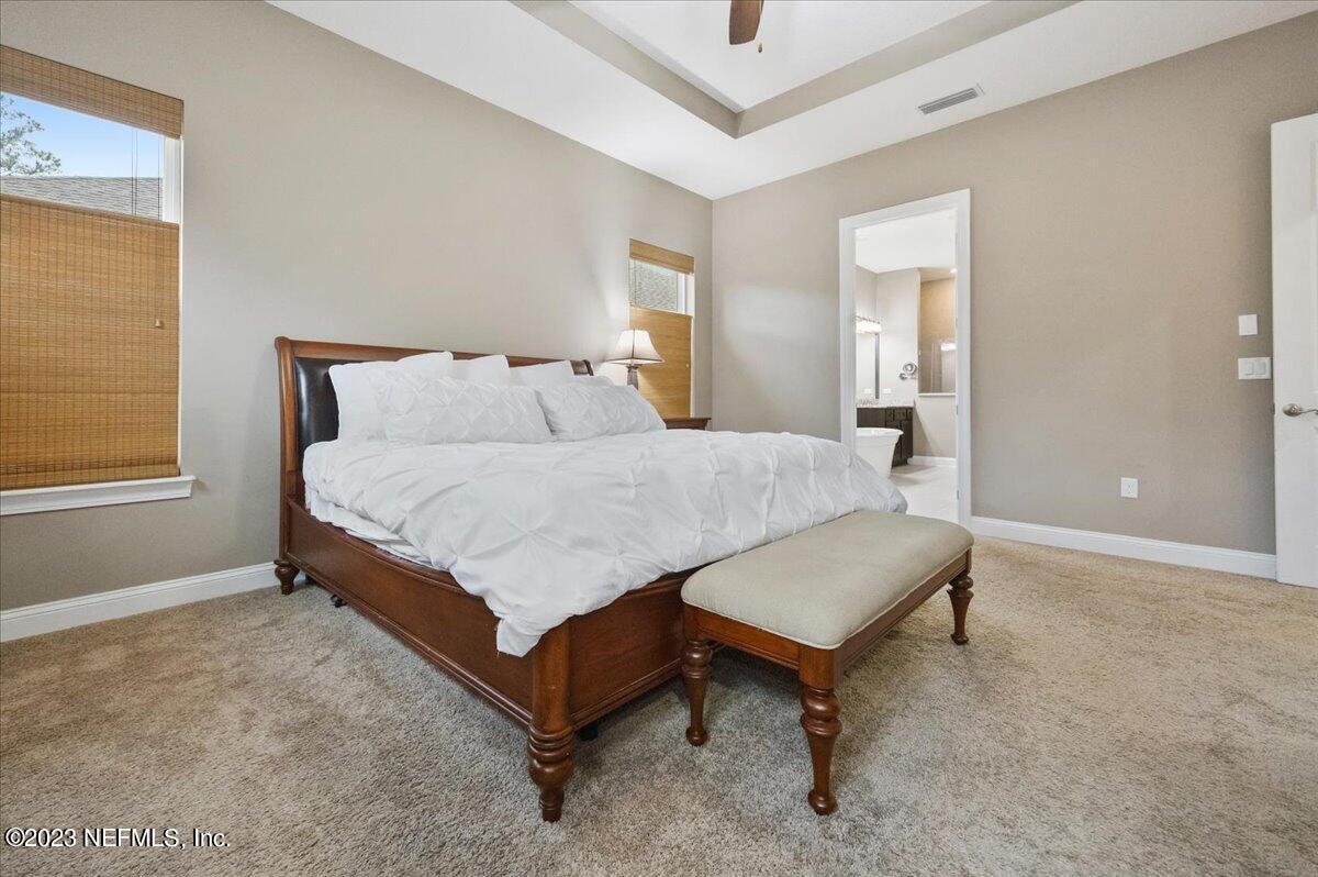 39 Seahill Drive St. Augustine, FL 32092 - Photo 17 of 37 a bedroom with a bed and a night stand