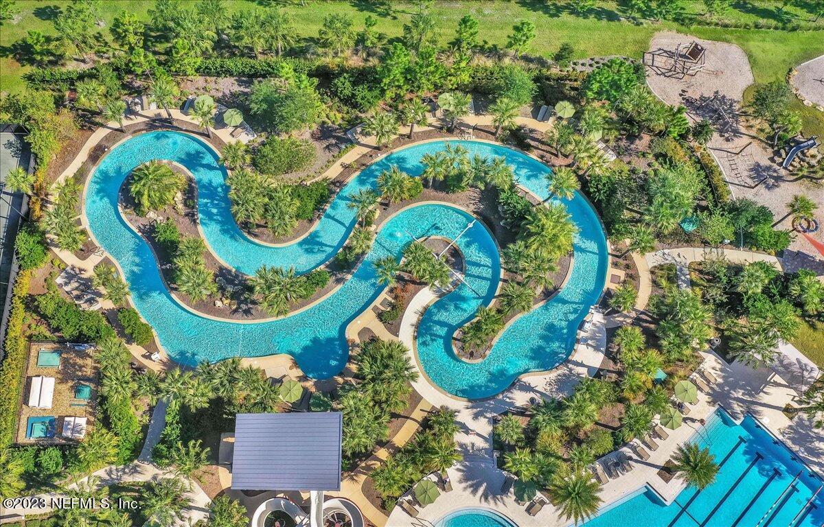 39 Seahill Drive St. Augustine, FL 32092 - Photo 35 of 37 an aerial view of a swimming pool playground and residential houses with outdoor space