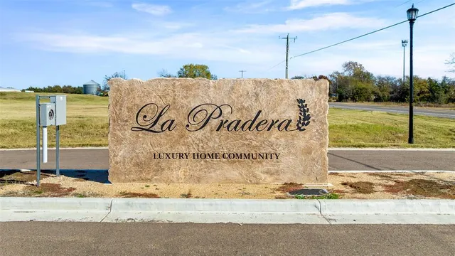 a view of a lake with a big yard