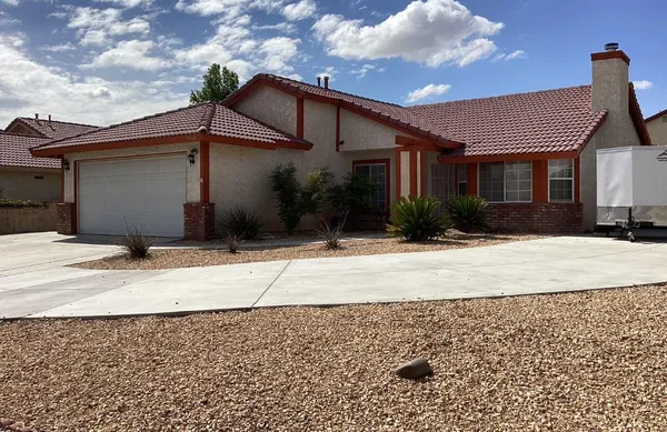 a view of a house with a garage