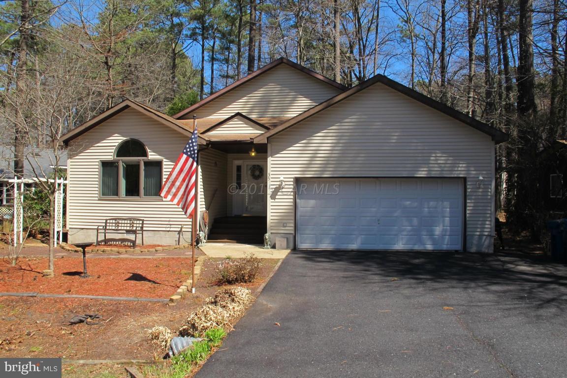 35 Falcon Bridge Road Berlin, MD 21811 - Photo 1 of 21 a front view of a house with a yard