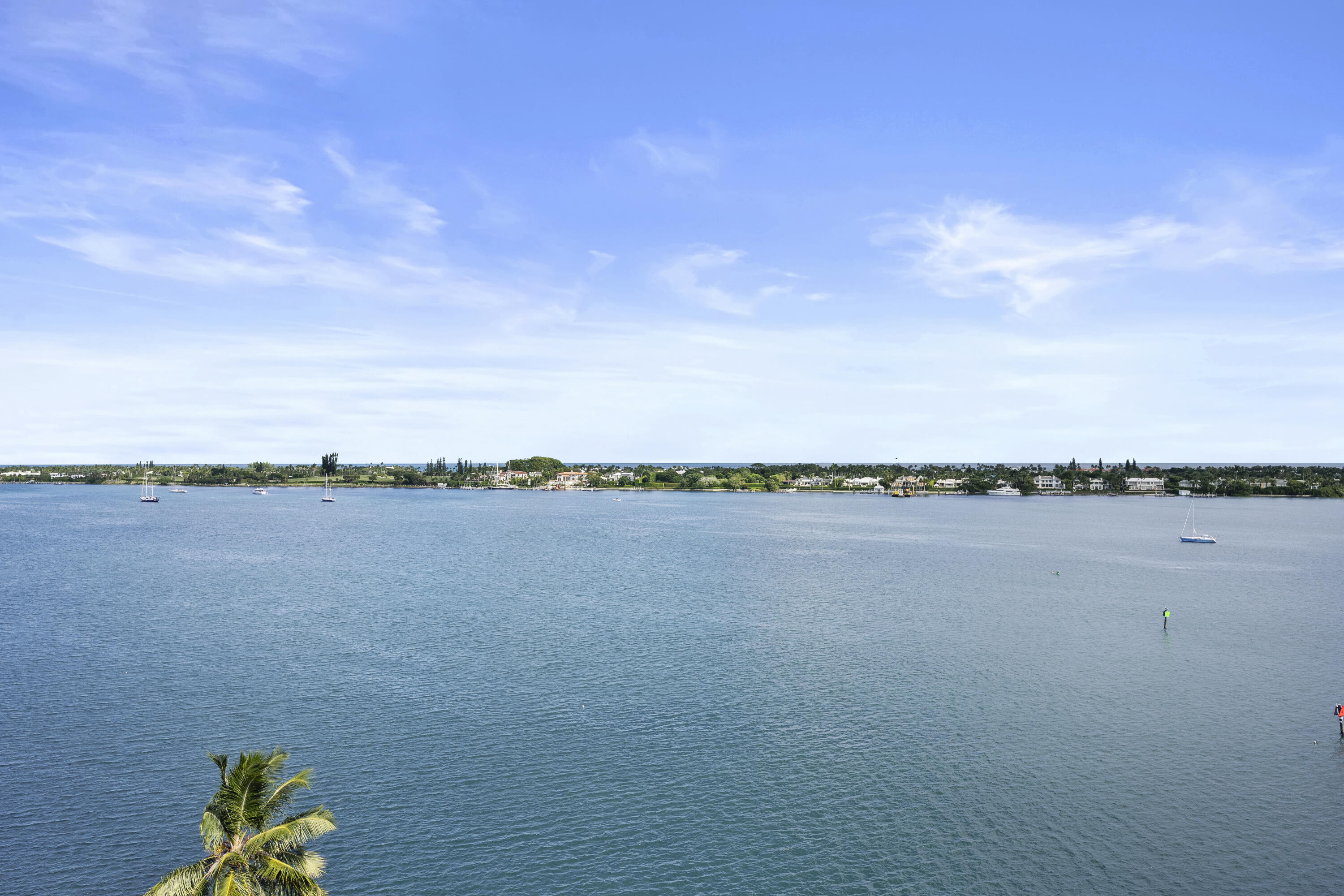 2600 North Flagler Drive, Unit 1007 West Palm Beach, FL 33407 - Photo 17 of 26 a view of a lake with a mountain
