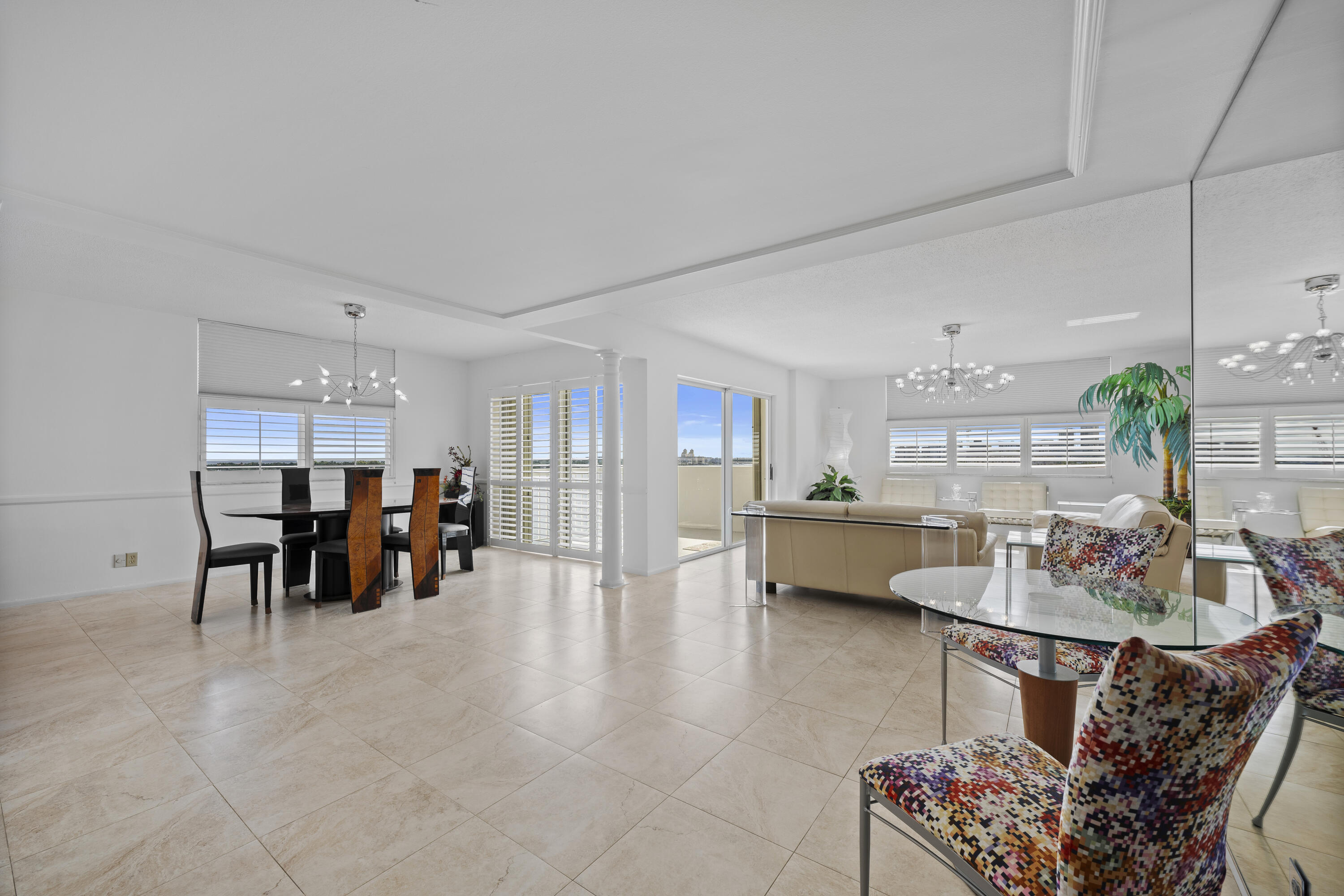 2600 North Flagler Drive, Unit 1007 West Palm Beach, FL 33407 - Photo 6 of 26 a living room with furniture and kitchen view