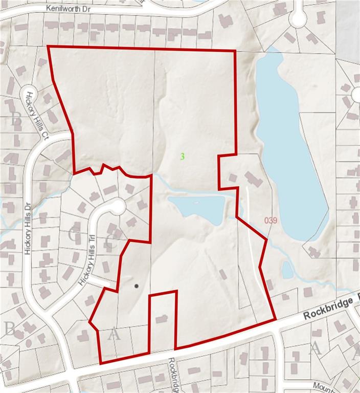 4994 Rockbridge Road Southwest Stone Mountain, GA 30083 - Photo 3 of 4 swimming pool view with a glass space and mirror on the wall