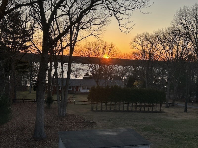 1296 Drift Road, Unit B Westport, MA 02790 - Photo 11 of 12 a front view of a house with a yard