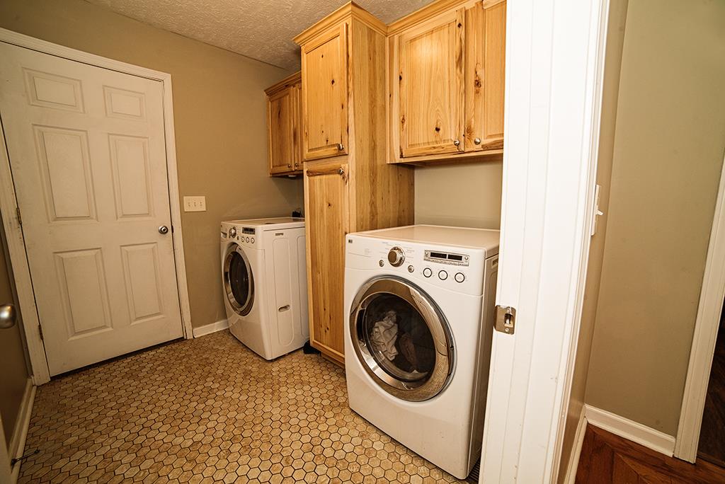 583 Windy Road Mount Juliet, TN 37122 - Photo 16 of 29 Notice the beautiful cabinets in the utility room.