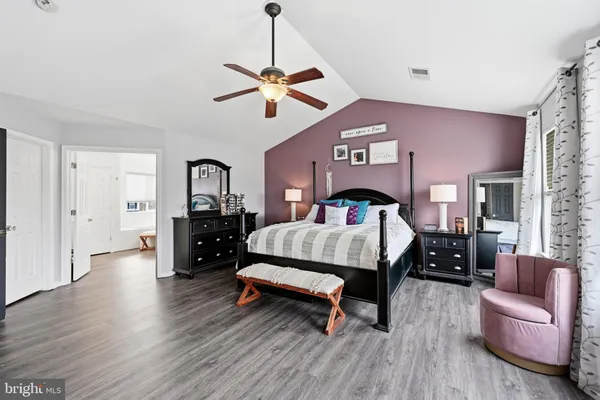 a bed room with a bed and a couch