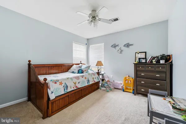 a bedroom with a bed and closet