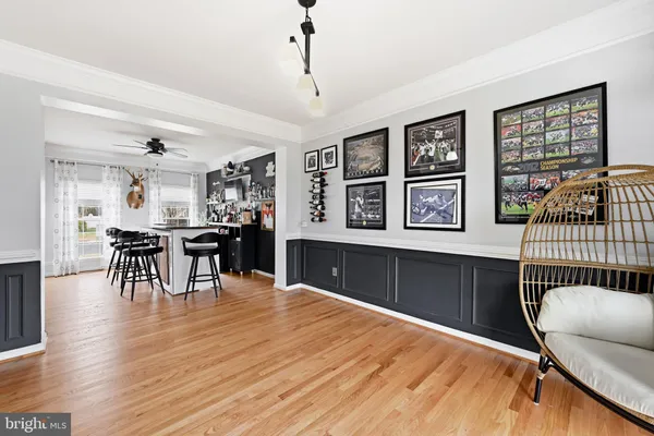 a livingroom with furniture window and wooden floor