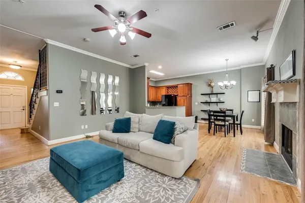 a living room with furniture and a table