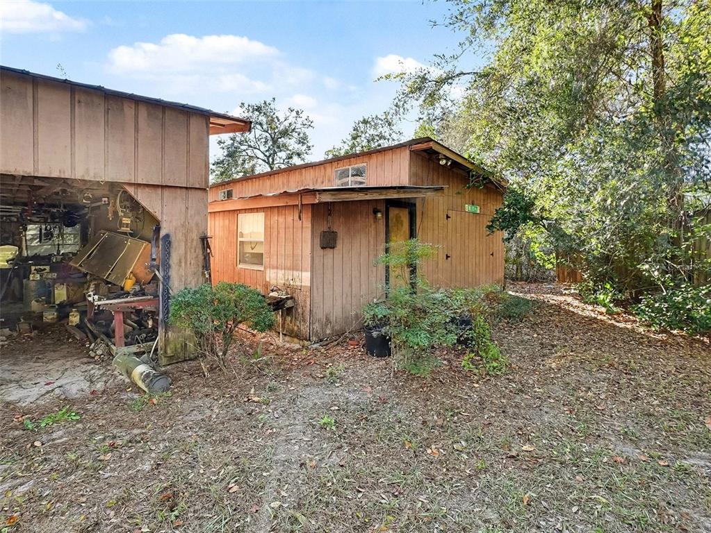 4818 Sadler Road Apopka, FL 32712 - Photo 3 of 21 a backyard of a house with wooden fence