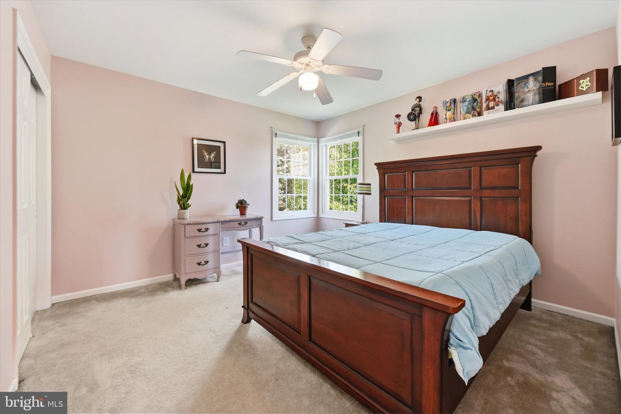 100 Cambridge Road Landenberg, PA 19350 - Photo 21 of 37 a bed sitting in a bedroom chandelier next to a window