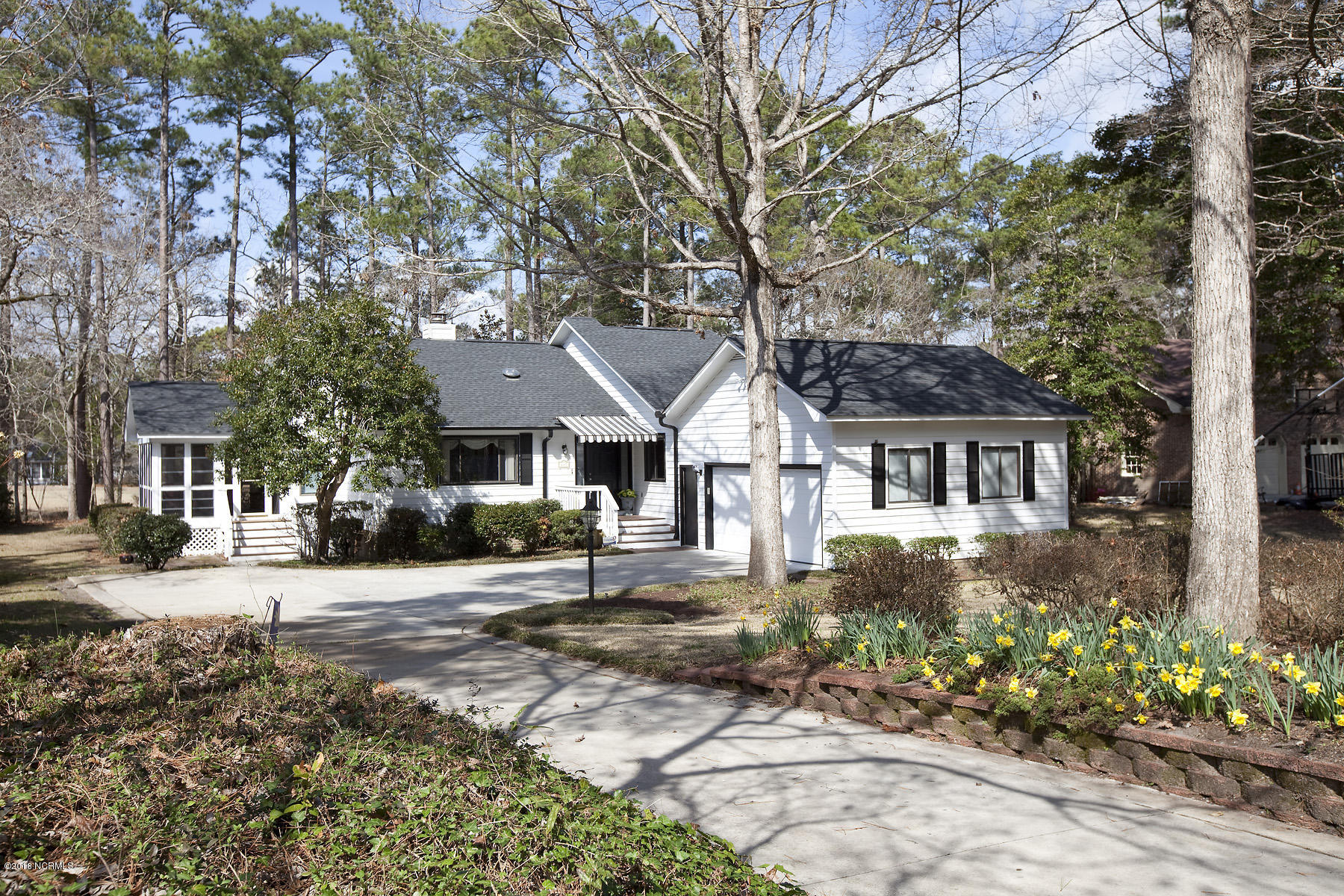 645 Ravenswood Road Hampstead, NC 28443 - Photo 1 of 39 01 ravenswood 645 1f bev_3503