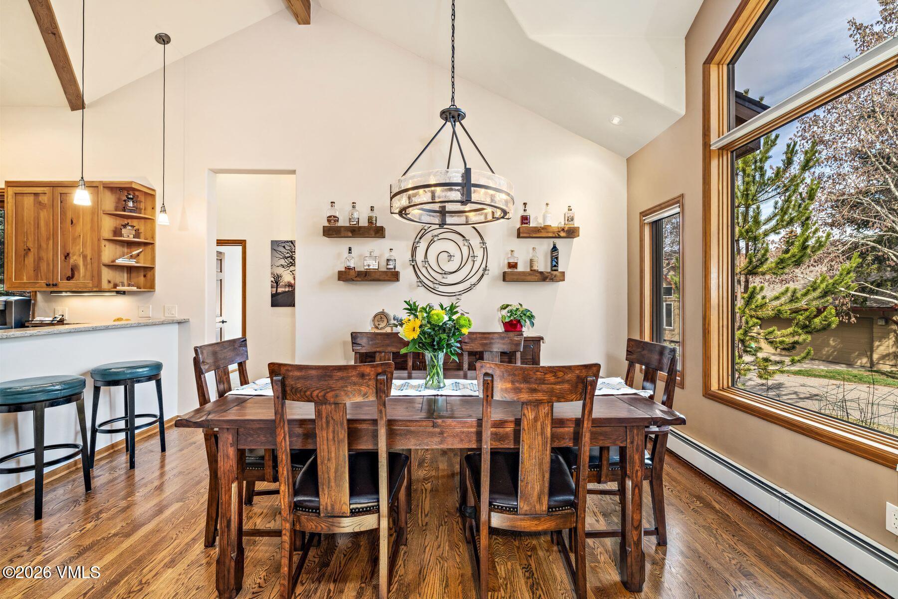 91 Creamery Trail Edwards, CO 81632 - Photo 4 of 44 a view of a dining room with furniture window and wooden floor